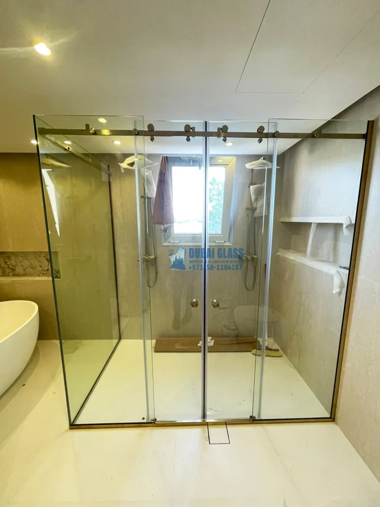 Corner double sliding shower glass partition with gold matte finish