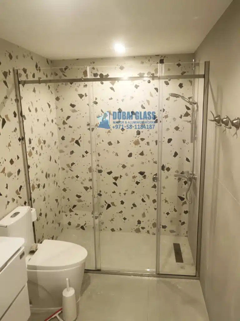 chrome-finished sliding glass enclosure