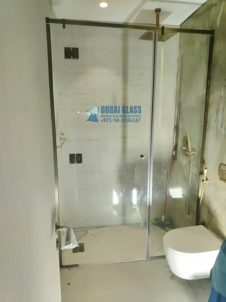 custom-color swing shower glass partition in dubai