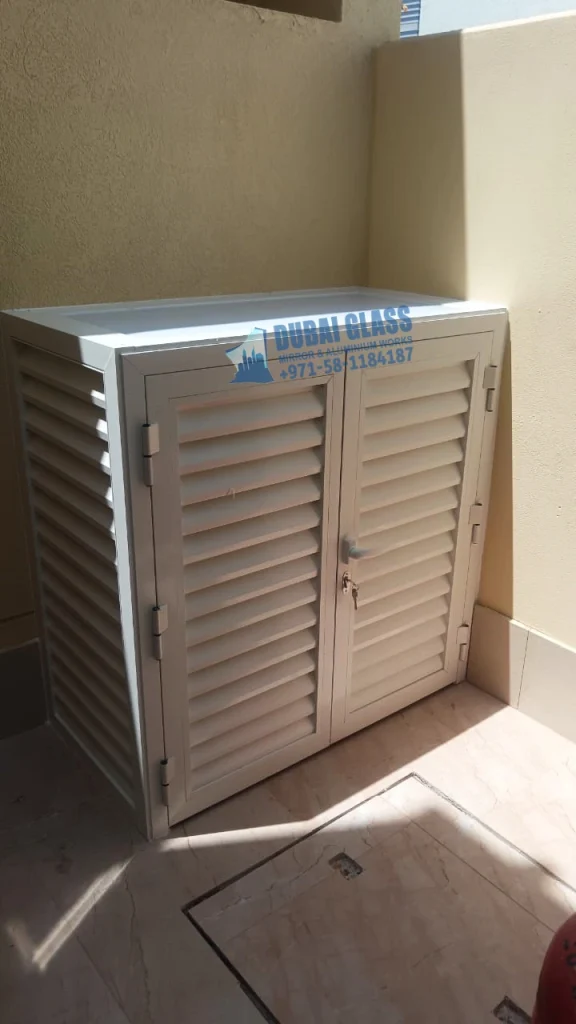 Durable Aluminium Doors for water motor outside the villa, designed for outdoor protection.