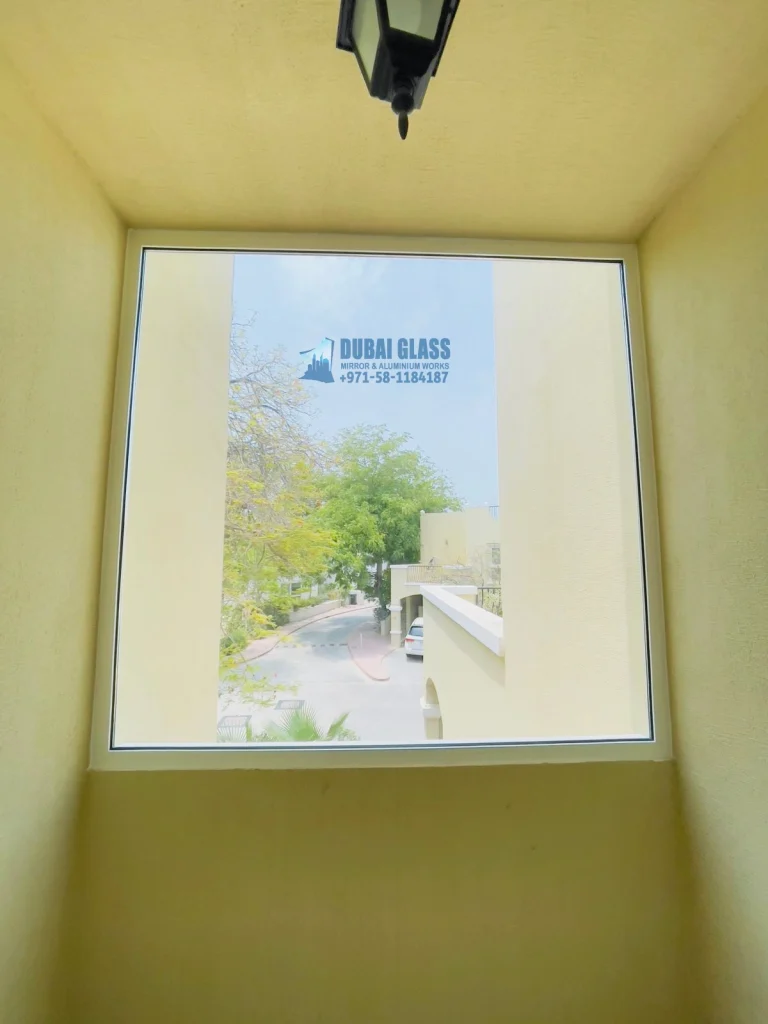 Aluminium White Frame Fixed Window installation, offering durability and modern aesthetics.