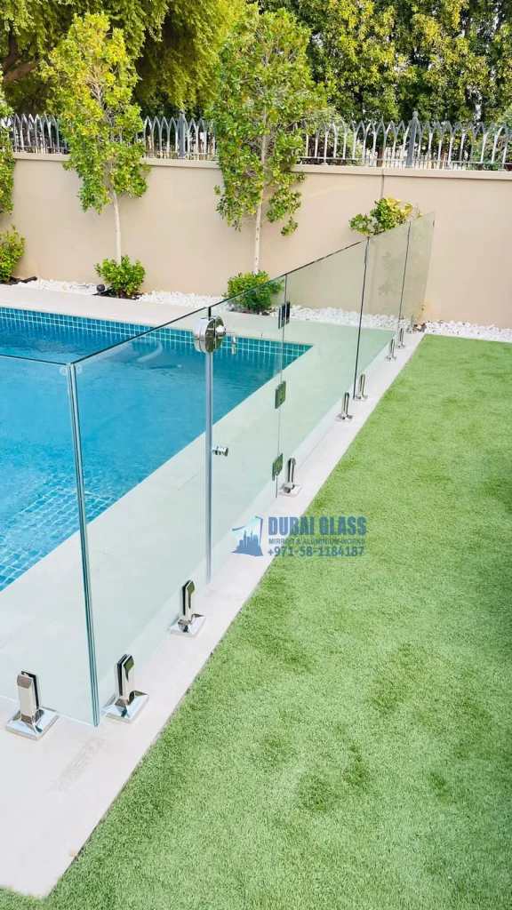 Baby Safety Glass Fencing with manual door closing, offering secure, stylish protection for children.