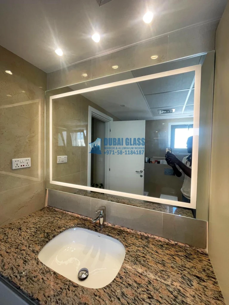 Backlit bathroom Wall Mirrors in Dubai, offering modern lighting and sleek design.
