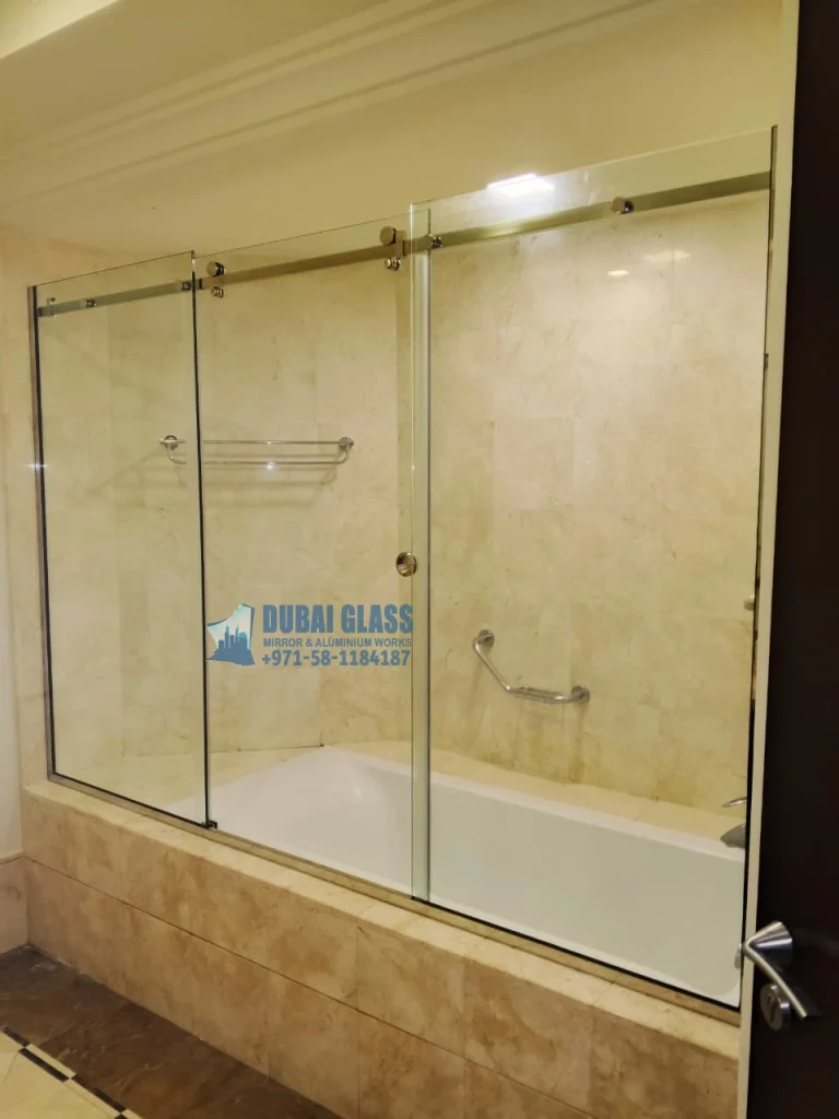 Bathtub Sliding Glass Doors in Dubai, combining sleek design with space-saving functionality.