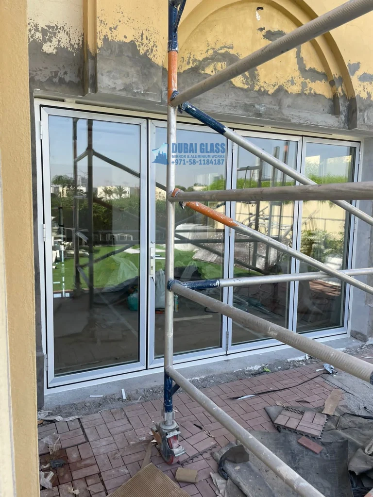 Bi-Folding Door for villa, offering a seamless connection between indoor and outdoor living spaces