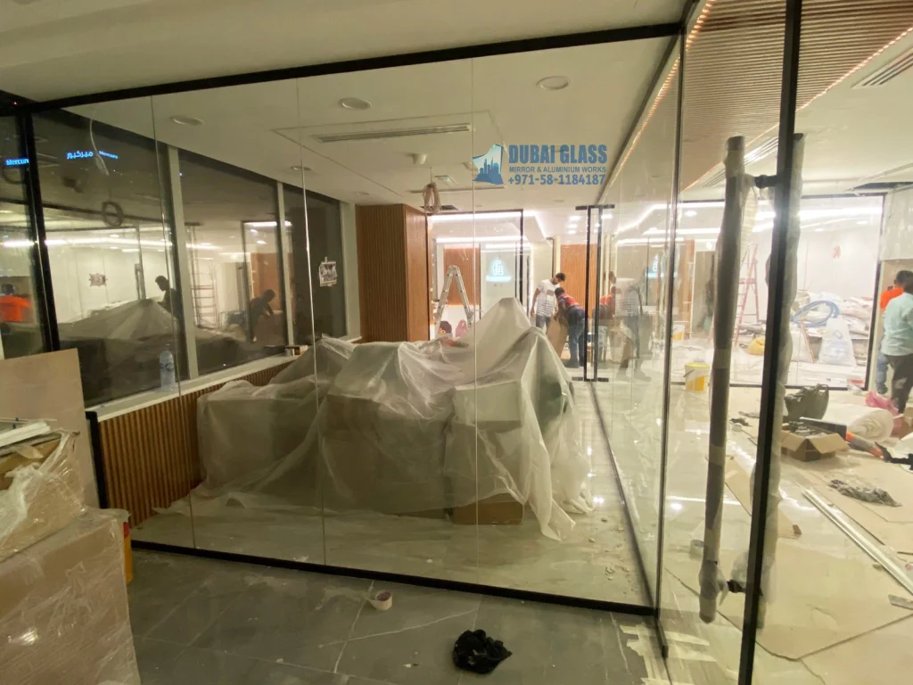 Black Aluminium Office Glass Partition in Dubai, offering a modern, sleek, and professional look.