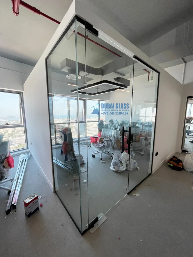 Corner office glass partition with black frame in Dubai