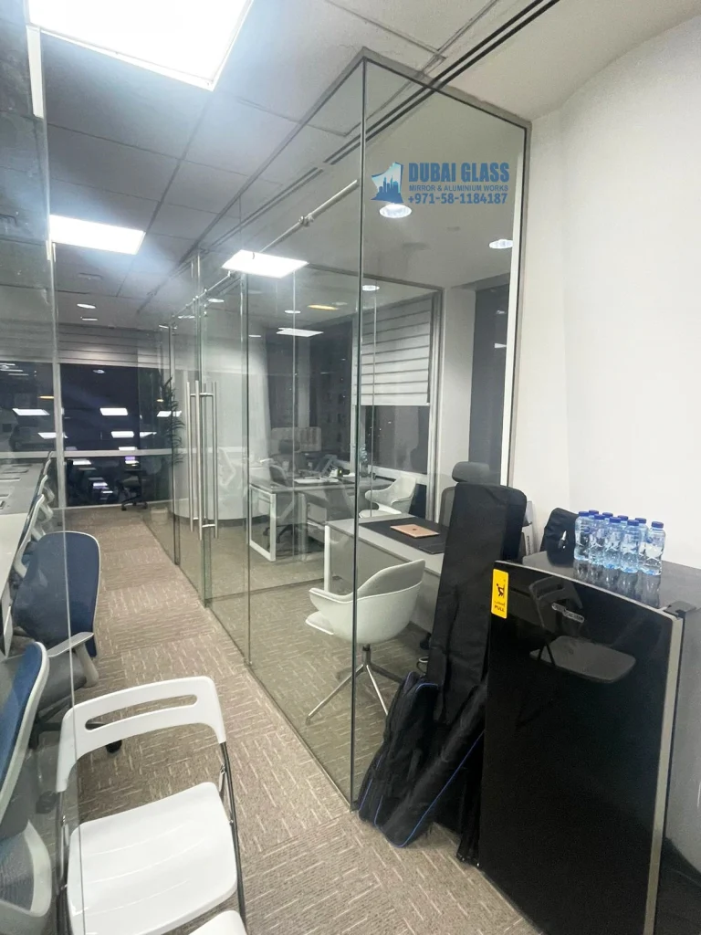 Full-height sliding glass partition Dubai by Dubai Glass Works