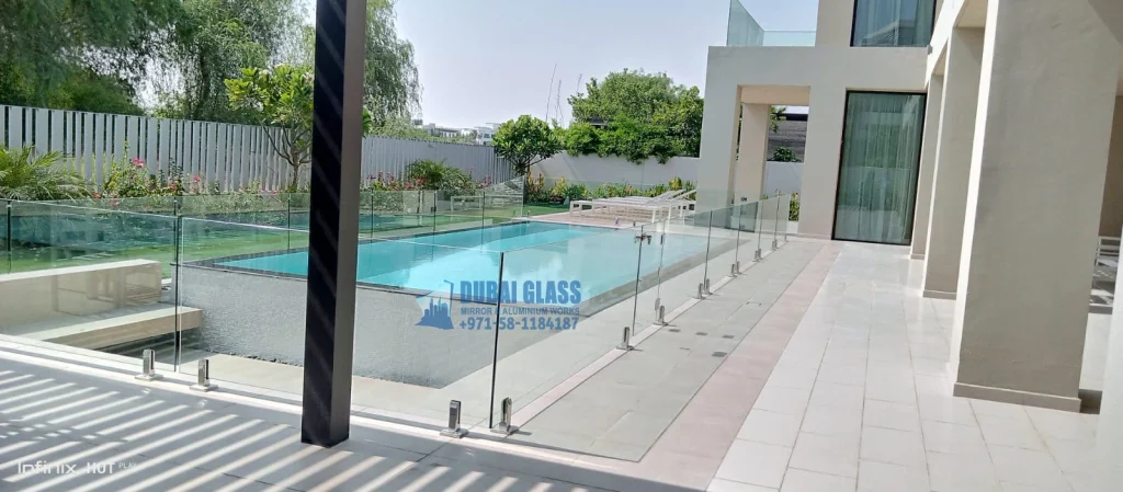 pool glass fencing in Dubai with square brackets