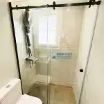 tempered clear sliding shower partition