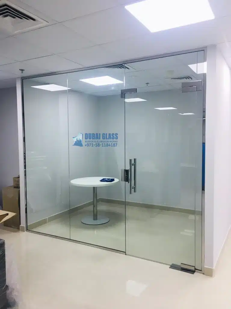 full-height office glass divider partition installation in dubai